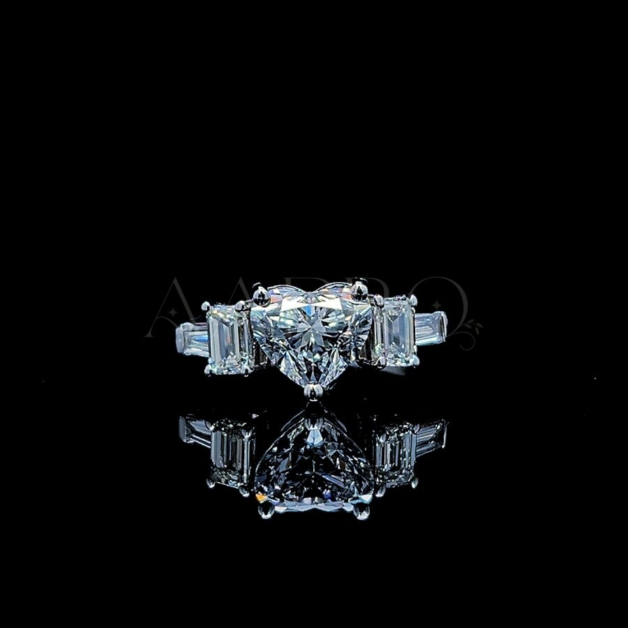 Heart-shaped lab-grown diamond ring with tapered baguette side stones